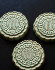 Three Mooncake Paperweights in our glossy Celadon glaze.
