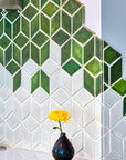 Detail shot of the Rhombus tile design and Bud Vase in Copper Iridescent.