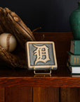 Old English "D" Tile on a handcrafted Stickley cabinet. 