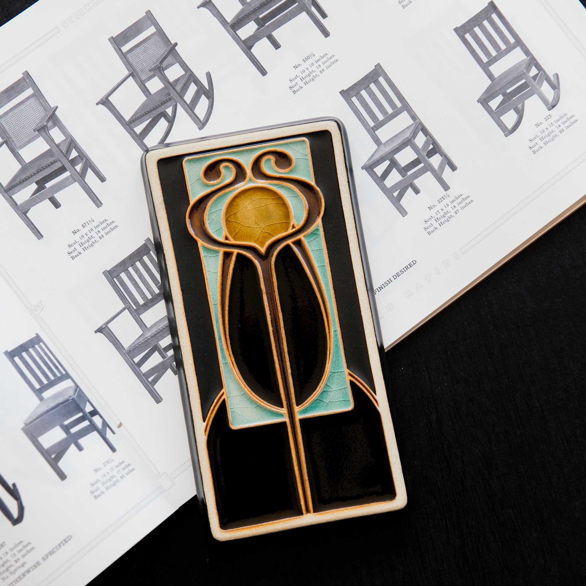 A Hand-Painted Stickley Tile in our glossy, multi-colored "Obsidian" palette. 
