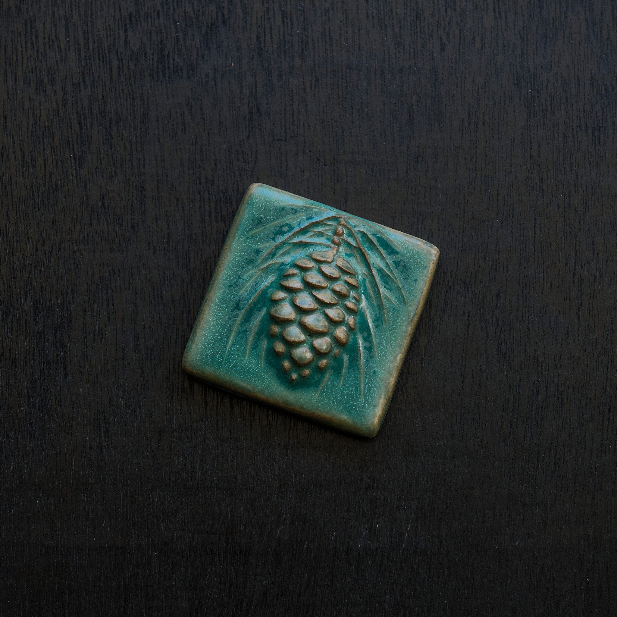 This tile features the crystalline, shimmering deep green Viridian glaze.