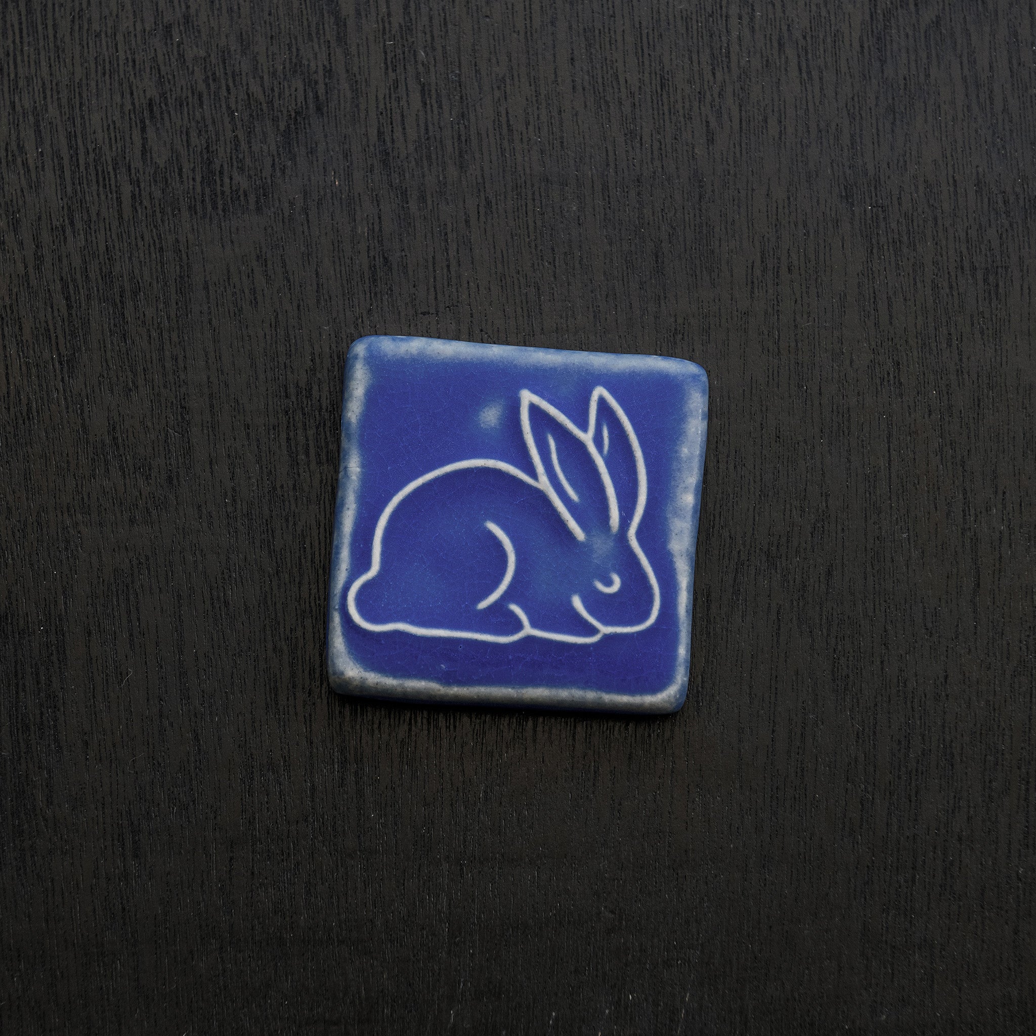 This ceramic Bunny Tile is featured in the matte Periwinkle glaze.