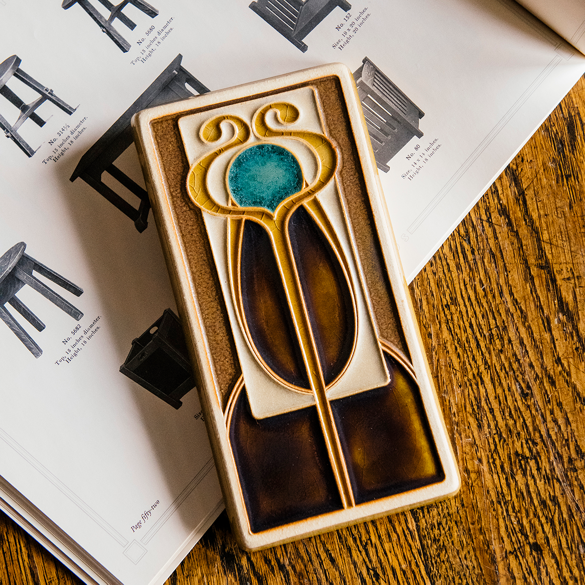 A Hand-Painted Stickley Tile in our glossy, multi-colored "Chestnut" palette. 