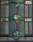 A close up shot of the geometric fireplace design which includes matte Laurel, Charcoal, Smoke and Iridescent Aurora glazes.