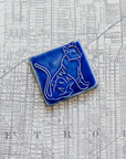 Glossy blue 3x3 Tigers Tile on a map of Detroit.