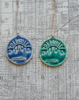 These Detroit Ornaments are featured in  the matte powder blue Steel and matte green Pewabic Green glazes. 