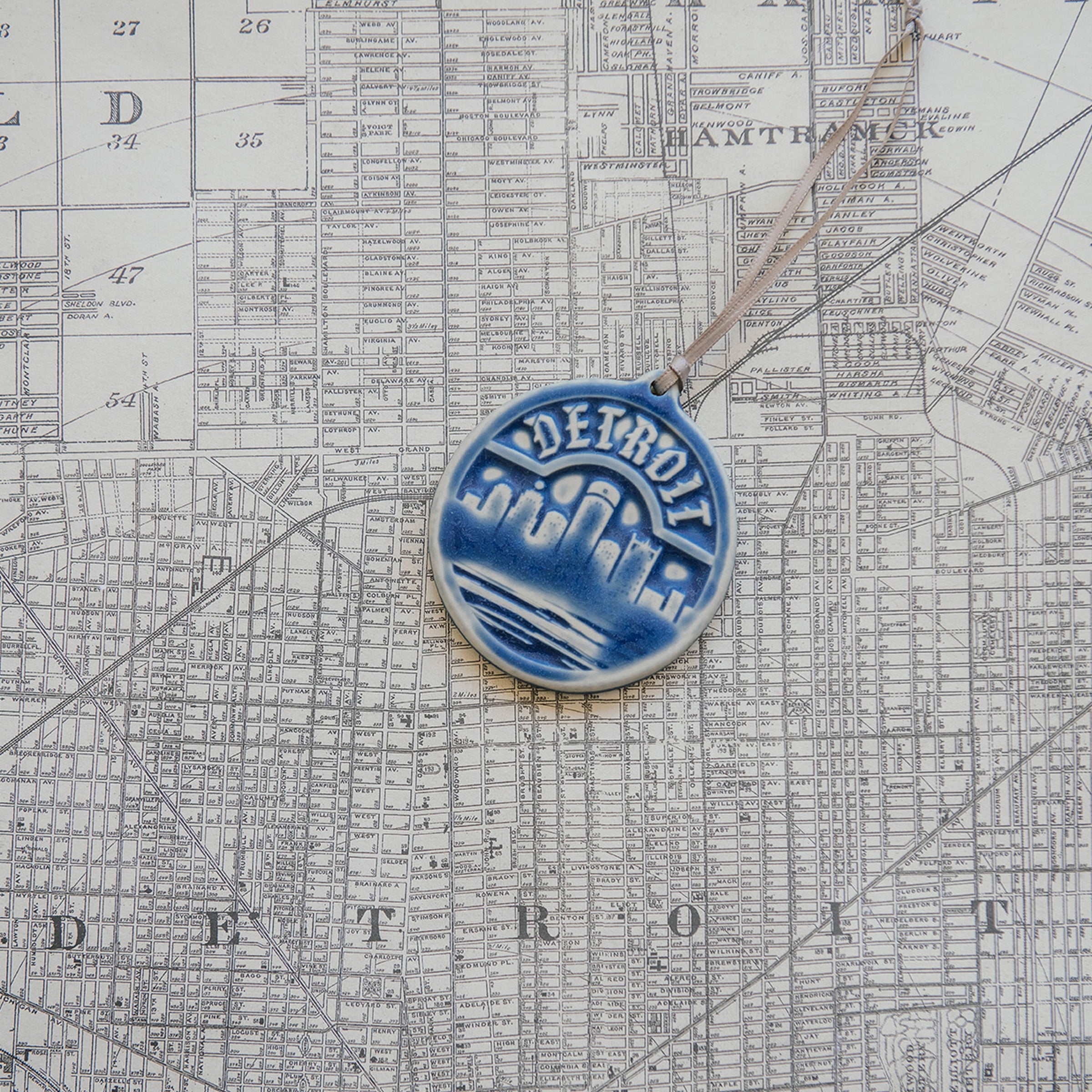 This Detroit Ornament features the matte powder blue Steel glaze.